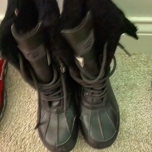 Kids Ugg leather snow boots.